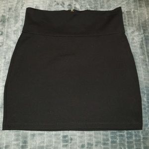 Stretchy black mini skirt from bebe size xs